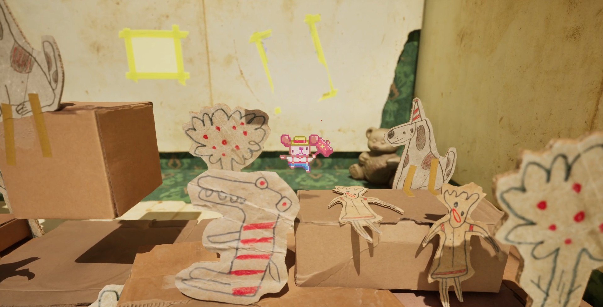 A world built from cardboard cut-outs and felt-tip drawings