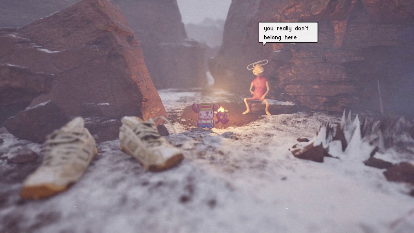A campfire meeting on a snowy ledge